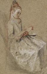 Mädchen sitzt mit einem Musikbuch auf dem Schoß